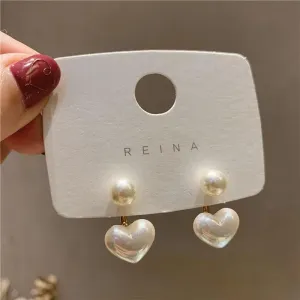 Heart Pearl Earrings: Elegant Feminine Jewelry - Stylish & Chic Look