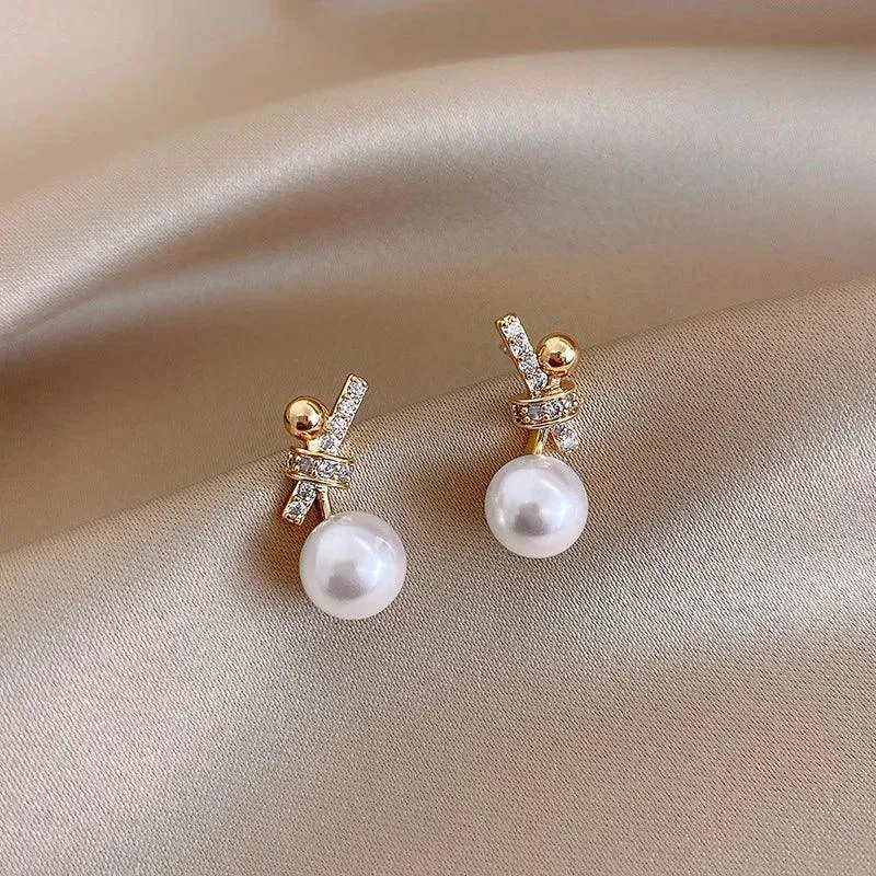 Heart Pearl Earrings: Elegant Feminine Jewelry - Stylish & Chic Look